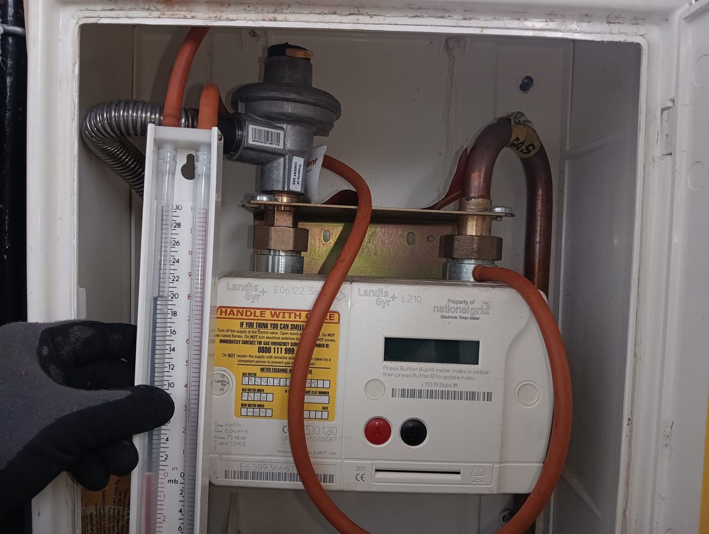 Gas tightness test at the meter during a CP12 landlord gas safety inspection in Rainham, East London