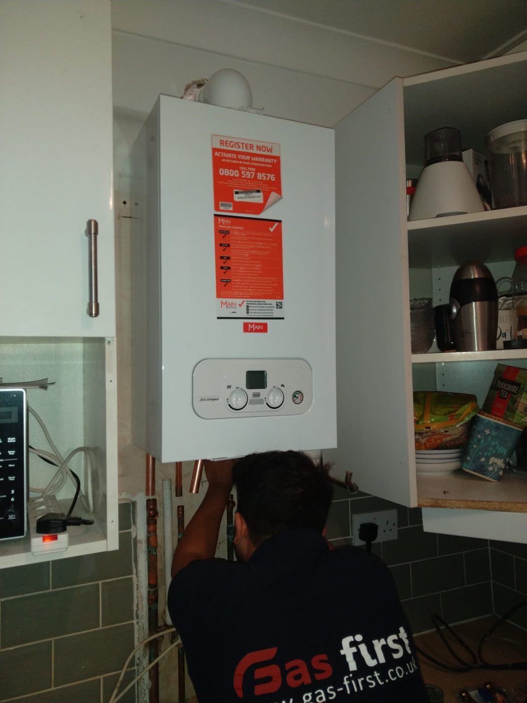 Gas First engineer installing a new Main Eco Compact combi boiler in Dagenham, East London