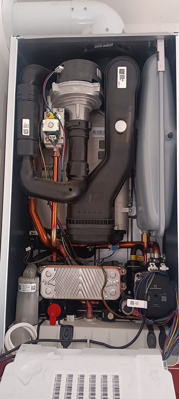 Gas Safe engineer servicing a newly installed Vaillant Pure combi boiler in Dagenham, East London