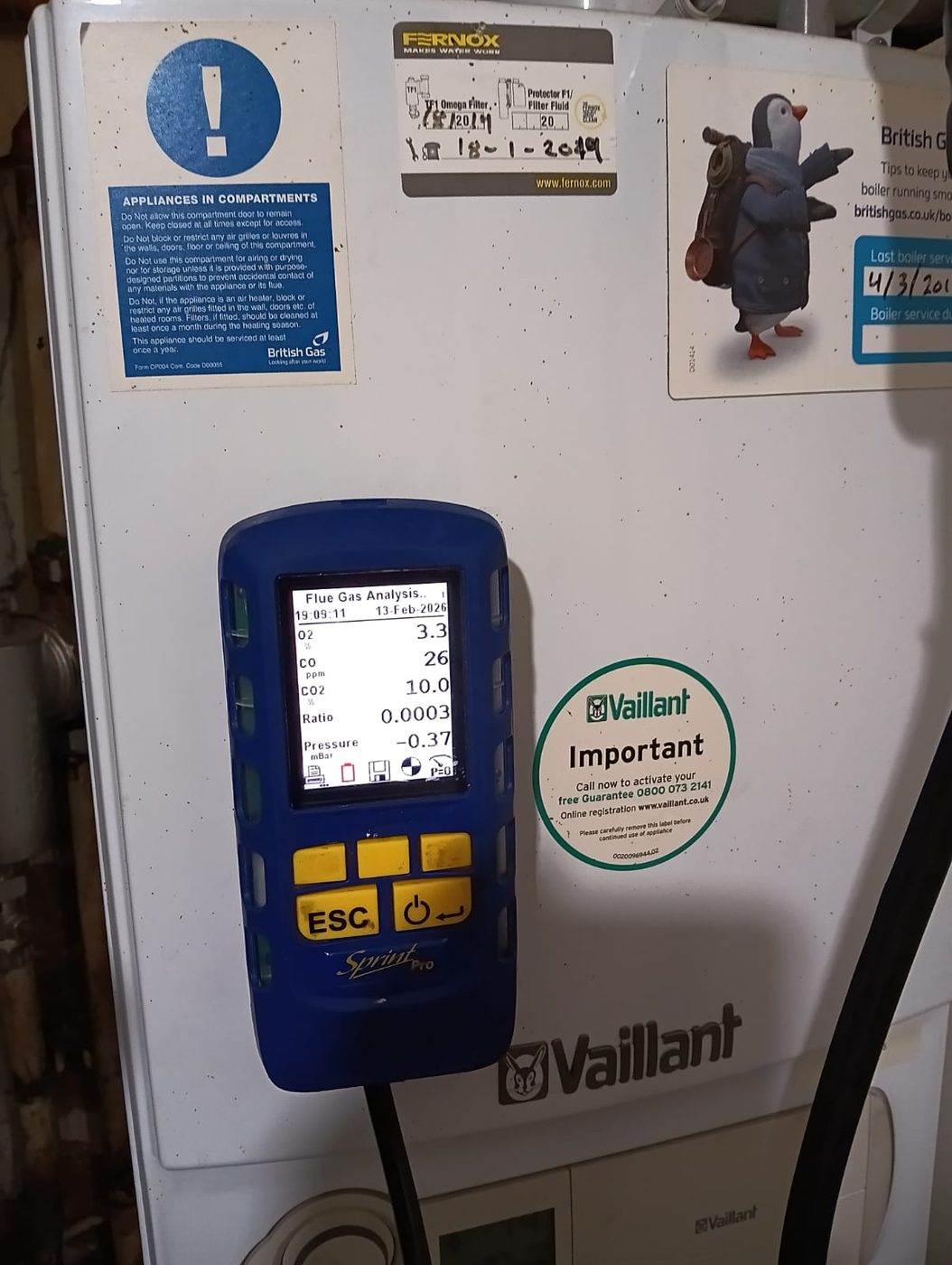 Gas Safe engineer carrying out an annual service on a Vaillant boiler in Elm Park, East London