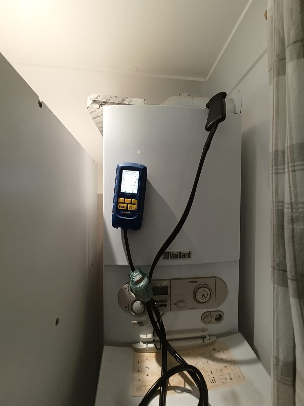 Gas Safe engineer servicing a Vaillant boiler and replacing a faulty PCB in Hornchurch, East London
