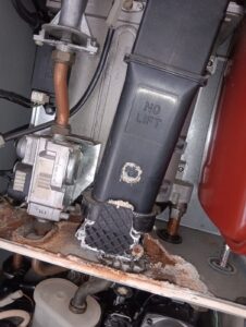 Corrosion and water staining on an Ideal boiler inspected by a Gas Safe registered engineer in Bow, East London